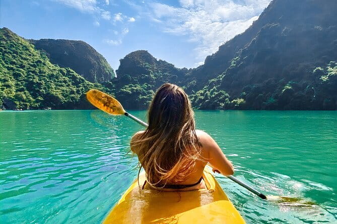 1 night cruise selection over Halong, Bai Tu Long or Lan Ha Bay - The Real Flow of the Day: Caves, Islands, Paddle Time, Then Dinner