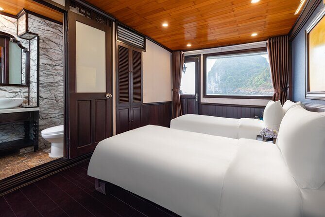 2-Day Boutique Cruise Discover Hidden Gems of Bai Tu Long Bay - The traditional boat night: sleep with the stars overhead