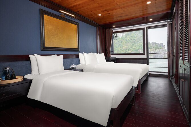 2-Day Boutique Cruise Discover Hidden Gems of Bai Tu Long Bay - Cabin comfort: ocean view, bathroom, and the basics that matter