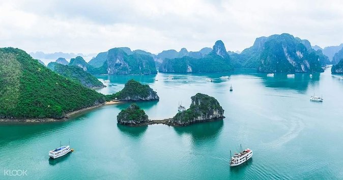 2-day Ha Long Bay Cruise included Transfer, Kayking and Swimming - Onboard Time Between Stops: Meals, Afternoon Tea, and a Cooking Class