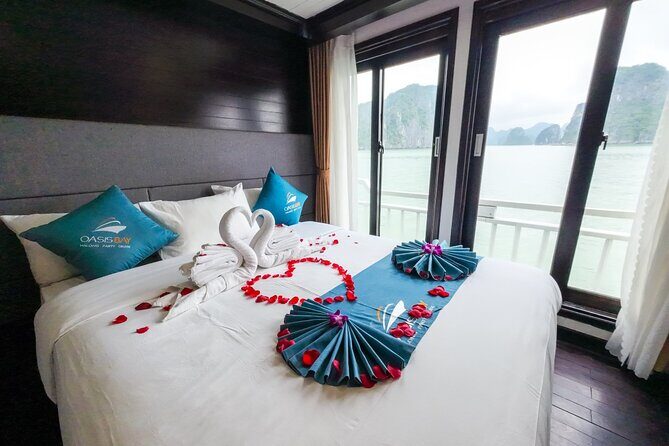 2 day Oasis Bay Cruise to Halong Bay from Hanoi - Day 1 on Halong Bay: kayaking, trampolines, beach time, then outdoor jacuzzis
