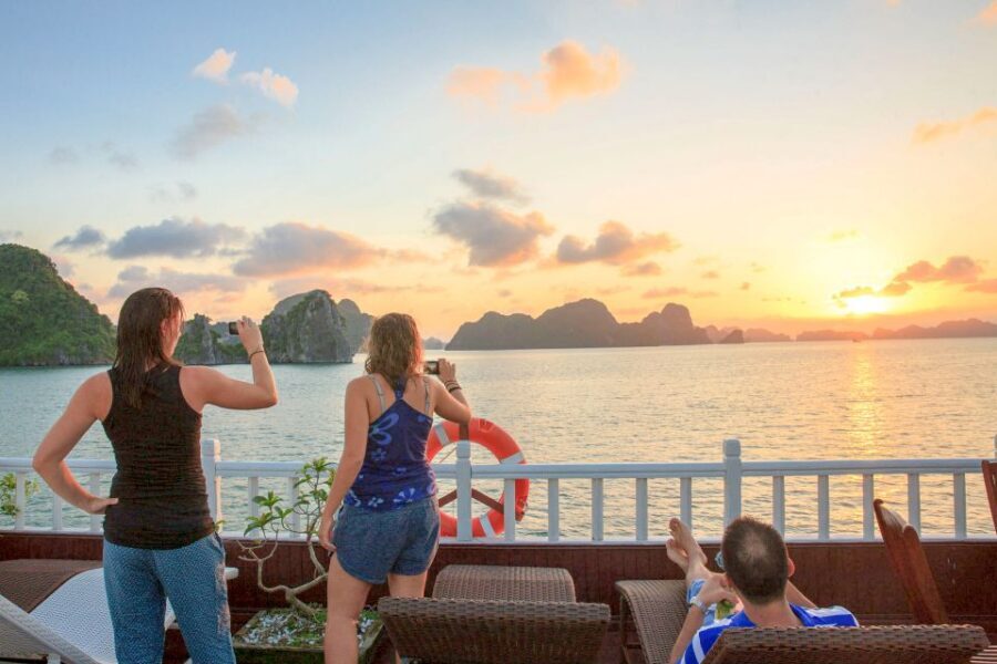 2-Day Royal Palace Ha Long Bay & Ti Top Island Cruise - Day 2: sunrise photos, Tai Chi, and Surprising Cave