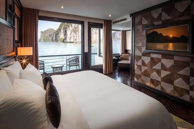 Ambassador Cruise Halong Bay–2 Days 1 Night with Private Balcony - Luon Cave by Bamboo Boat: The Classic Karst Experience in a Smaller Craft