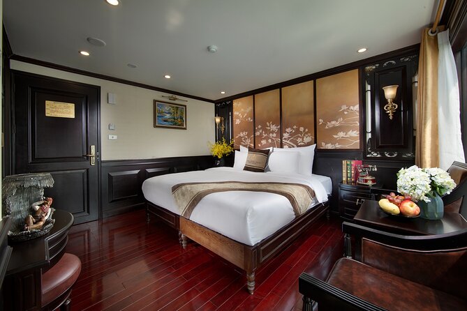 Athena Royal Cruise - Luxury Halong Bay Overnight Cruise 2D1N Tour - Your Included Suite: Private Balcony Comfort on the Bay