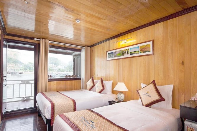 Bai Tu Long Bay Boutique Cruise: Visit Bai Tu Long bay & Overnight boat in 2 day - Day 1 on the Water: Check-In, Floating Village Views, Kayak and Swim