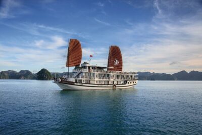 BOUTIQUE CRUISES Halong Bay 2 Days,1 Night Tour: Swimming,Caving, and Kayaking - Day 1 on the bay: caves, kayaking, swimming, and mountain views