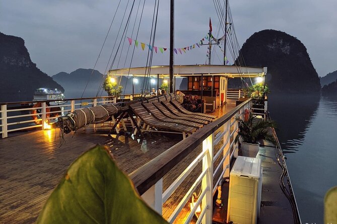 BOUTIQUE CRUISES Halong Bay 2 Days,1 Night Tour: Swimming,Caving, and Kayaking - Day 2: breakfast on the boat, photo time, then back to Tuan Chau and Hanoi