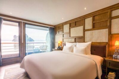 Chill Cruise Full-Day Explore Halong Bay - Boss Cruise cruising time and Bai Tu Long Bay: wide views on a busy planet