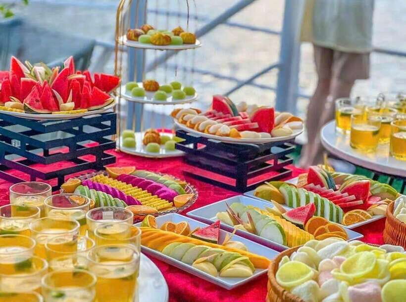 D'Charme Luxury Day Cruise Discover the Stunning Lan Ha Bay - Afternoon tea party and sunset on the water