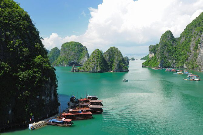 Excursion to Ha Long Bay with Titop Island and kayaking in Luon Cave - From Hanoi to Tuan Chau: the ride that sets the whole day