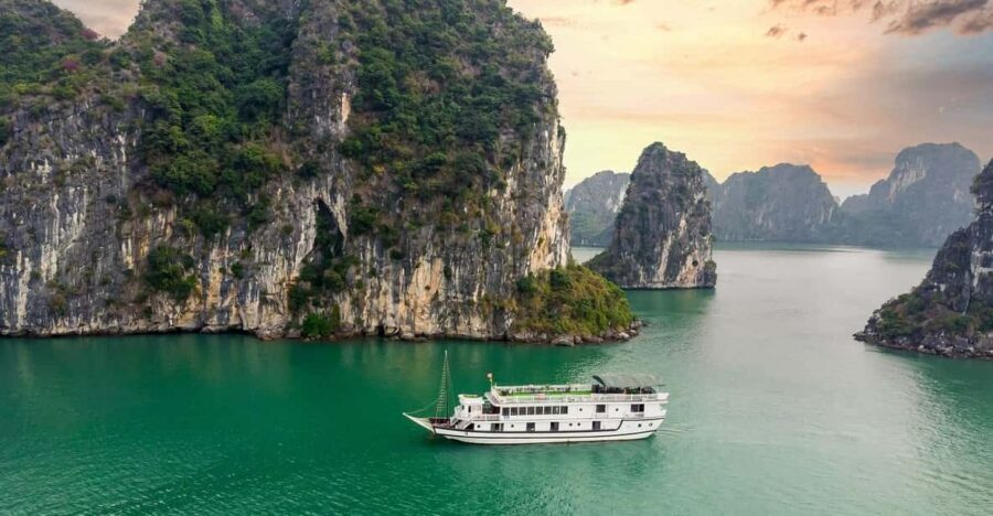 From Hanoi: 2-Day Ha Long Bay Boat Tour - Day 1: Sung Sot Cave, Titop Island, and that spring roll dinner rhythm