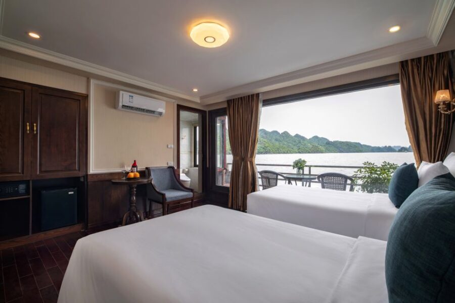 From Hanoi: 2-Day Halong and Lan Ha Bay La Pandora Cruise - Day 2: sunrise, Dark & Bright Cave by rowboat, and the ride back