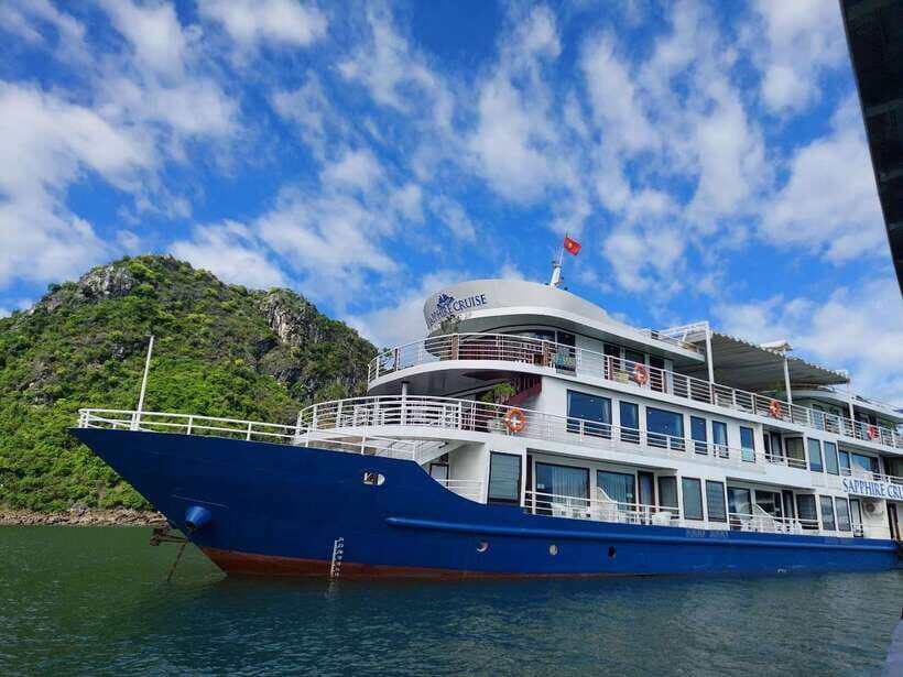 From Hanoi: 2-Day Halong Sapphire Cruise with Balcony Cabin - Day 1 on Sapphire Cruise: check-in, seafood lunch, and a mid-bay swim moment