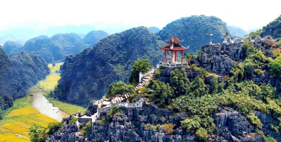 From Hanoi: 2-Day Ninh Binh Tour with Ha Long Bay Cruise - Titop Island: swimming and a peak for photos