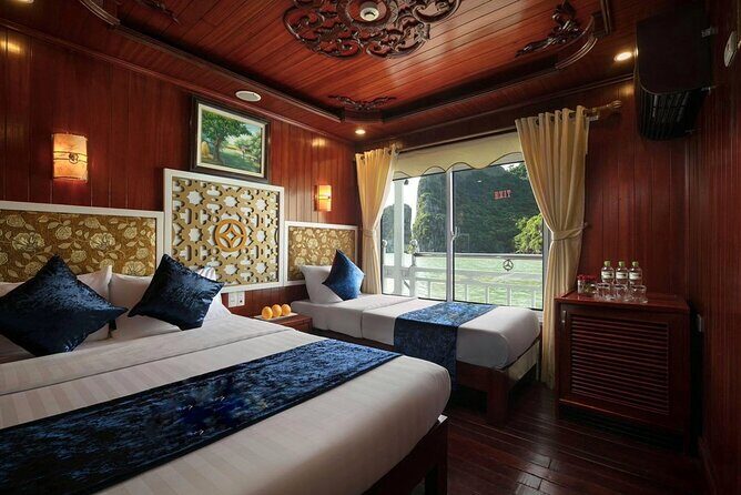 From Hanoi: 2D1N Ha Long Bay Deluxe Cruise with Bus Limousine - Titop Island in the afternoon: beach time and the view climb