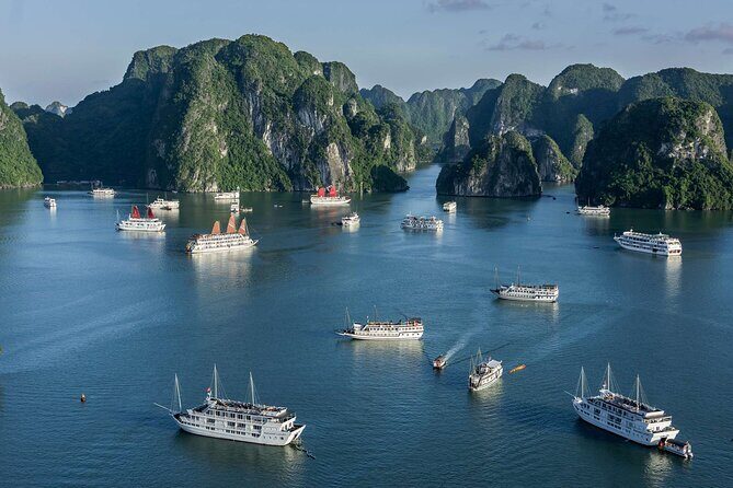 Full-Day Halong Bay Cruise with Limousine Pickup - Tuan Chau marina and the cruise run past Thumb Rock and Dog Rock