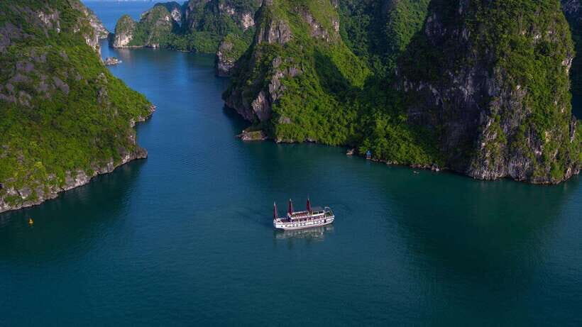 Ha Long Bay - Bai Tu Long Bay Luxury Boat Tour & Transfer - Titop Island: Climb for 360 Views, Then Actually Enjoy the Beach