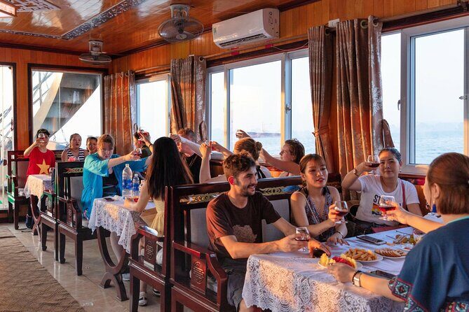 Ha Long Bay Cruise Day Tour with lunch, kayaking, surprise cave & titop island - Onboard Comfort: views from the top deck, lunch, and water rules
