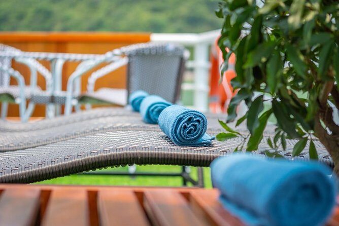 Ha Long Bay Cruise Day Tour with lunch, kayaking, surprise cave & titop island - Titop Island: steps up for panorama views and a swim stop