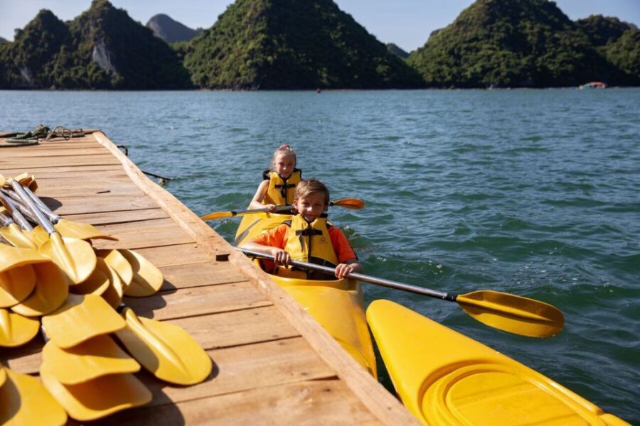 Ha Long & Lan Ha Bays: 2-Day Cruise with Meals & Kayaking - Day 1 on the water: Bright Cave, Vietnamese cooking, and sunset waiting