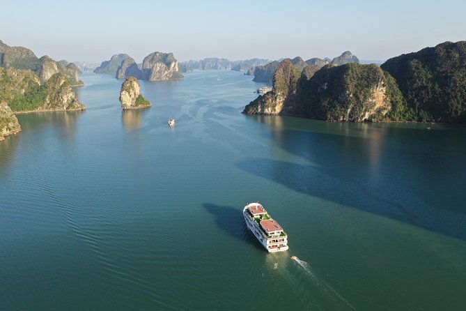 Halong Bay 2 Days 1 Night Included Transfer from Hanoi - Day 2 starts early: exercise, breakfast outside, then kayaking on calm water