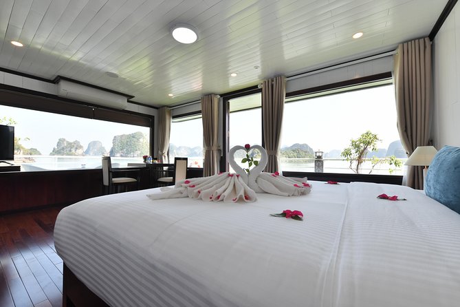 Halong Bay 2 Days 1 Night Included Transfer from Hanoi - Day 1: Surprising Cave, Ti Top Island, and the fun onboard rhythm