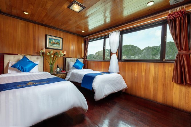 Halong bay Boutique Cruise 2D/1N tour: Kayaking, swimming, Titop island & cave - Traditional wooden boat, modern-day value: what this cruise really delivers