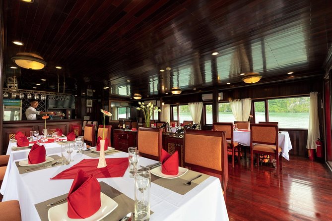 Halong bay Boutique Cruise 2D/1N tour: Kayaking, swimming, Titop island & cave - Day 1: tender transfer, briefing, and seafood lunch before the bay work begins