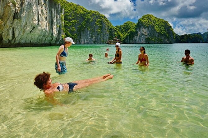 Halong Bay Day Tour 6Hour Deluxe Cruise Limousine Bus Small Group - Ti Top Island: swim break and the short climb for panoramic photos