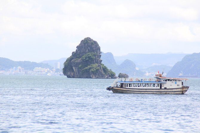 Halong bay Full Day Cruise trip: kayaking, surprise cave, titop island, lunch - Lunch on Board: Seafood Meal Included, Vegetarian Needs Advance Note