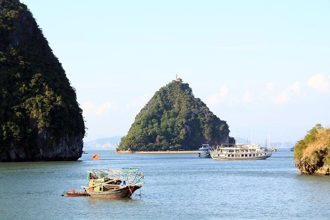 Halong bay full day trip: Visit Surprise cave, Titop island, kayaking & swimming - Surprise Cave hike: quick admission-included adventure time
