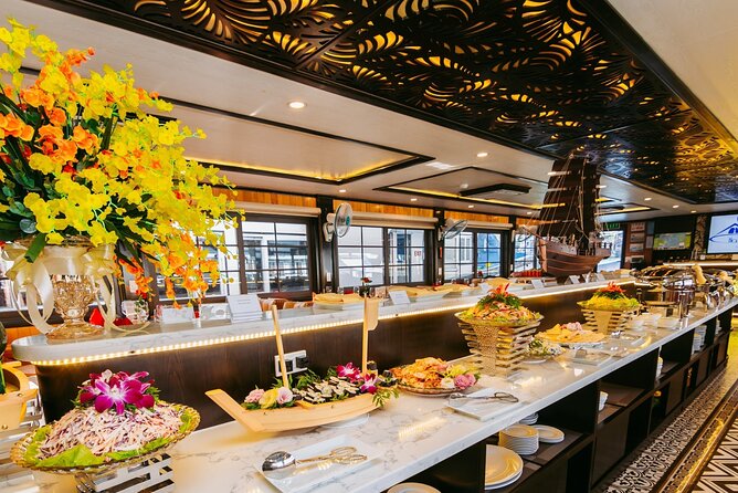 Halong bay Luxury Cruise Trip: Titop Island, Amazing Cave & Kayak - Titop Island: The Summit View and Beach Break