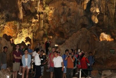 Halong Islands, Cave, Kayak, Bamboo Day Tour w Dragonfly Cruise - Halong Bay cruise time: karst views and the Fighting Cocks island photo moment