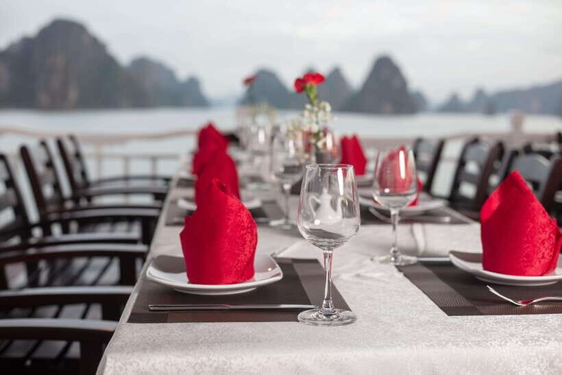 Hanoi: Ha Long Bay 2-Day 1-Night Tour by 4-star Luxury Junk - Evening onboard: spring rolls, squid fishing, and sunset drinks