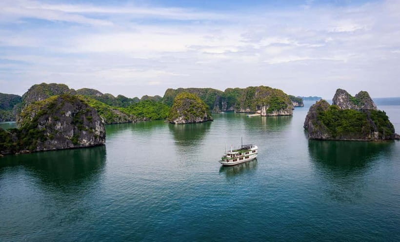 Hanoi/Ninh Binh: 2-Day Lan Ha Bay & Cat Ba with Small Cruise - Day 1 on Cat Ba and Lan Ha Bay: tide-flex caves, swimming, and limestone islets