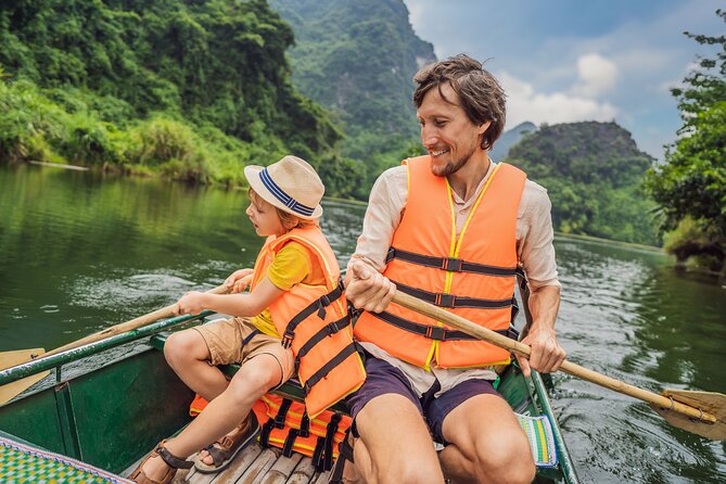 Hanoi, Ninh Binh and Ha Long 6 Day 5 Night Overnight Cruise Tour - Day 3: Hoa Lư temples, cycling through limestone, Trang An caves, then Mua Cave views