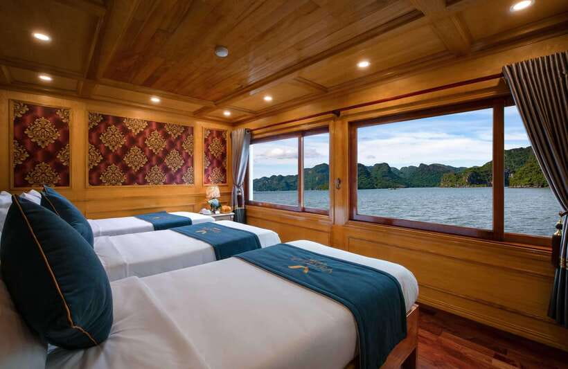 Lan Ha Bay: 2-Day Cruise with Meals, Activities and Pickup - Viet Hai Village in Cat Ba National Park: bike ride, rainforest tunnel, and local life