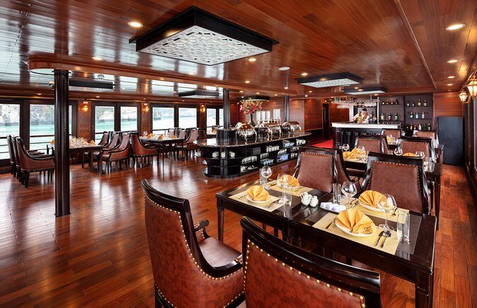 Luxury 4<em> Cruise 2Days 1night Ha Long Bay – V'spirit Premier Cruise – V’Spirit Premier: a luxury ship that fits Lan Ha Bay’ /><br />
This cruise is positioned as a new luxury option on Lan Ha Bay, and the ship design is meant to feel distinctly Vietnamese rather than generic “cruise ship sleek.” You’re looking at a <strong>3-deck</strong> layout with an oriental tone, traditional decorative details, and a focus on quality materials. In plain terms, that means the ship feels like part of the trip—not just the transport between activities.</p>
<p><p>You’ll also appreciate the practical side of that “new luxury” approach. The cabins are well-furnished, and you get a <strong>private balcony</strong> in every cabin. On a 2-day itinerary, that little space matters. It’s where you can wake up, step outside for the morning air, and watch limestone shapes drift past without asking staff for a better view spot.</p>
</p>
<p><p>And yes, WiFi is included onboard, which can be handy if you want to send photos while they’re still fresh in your phone. It won’t replace going outside, but it’s a nice “modern life” touch on a traditional-water journey.</p>
</p>
<h2 id="price-and-what-youre-actually-buying-for-225">Price and what you’re actually buying for $225</h2>
<p> Cruise 2Days 1night Ha Long Bay – V'spirit Premier Cruise – Price and what you’re actually buying for $225′ /><br />
At <strong>$225 per person</strong>, this cruise sits in the midrange for a 2-day, 1-night Lan Ha Bay experience with transfers and multiple included activities. The value comes from stacking several costs you’d otherwise pay separately: round-trip <strong>luxury limousine transfers</strong>, the <strong>sailing day with meals</strong>, entrance fees, kayaking, and extra onboard experiences like Tai Chi and a cooking demo.</p>
<p><p>Also, the itinerary includes enough structured time that you’re not constantly figuring out how to fill the gaps. You’re given a clear flow: caves and sampans in the afternoon, a sunrise start the next morning, kayaking in a specific area, then food and back to Hanoi.</p>
</p>
<p><p>The main reason this price can work for you is that it feels “complete.” You’re not paying just for a boat. You’re paying for a plan that covers the scenery, the water activities, and the food in between—while still leaving breathing room to enjoy the views from the ship.</p>
</p>
<div style="margin: 20px 0; padding: 15px 0;"><p>Other Halong Bay cruises we