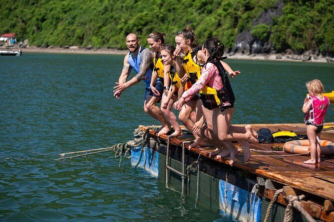 Luxury 4<em> Cruise 2Days 1night Ha Long Bay – V'spirit Premier Cruise – Night onboard: cabins, balcony time, and real downtime’ /><br />
You’re on a <strong>2 days / 1 night</strong> schedule, which is long enough to enjoy the ship after the excursions, but short enough that you’re not spending your entire trip stuck on it.</p>
<p><p>Your cabin is set up for comfort with good furnishing, and again, the big win is the <strong>private balcony</strong>. This is where you can step out for a quieter look at the bay before you sleep. It’s also a good spot to check the next morning’s mood—cloud cover, wind, and how lively the water looks.</p>
</p>
<p><p>Meals are part of the evening experience too. Dinner is included, and the overall food quality is a recurring theme. One review specifically called out that the food was great, and another mentioned a <strong>happy hour</strong>, which suggests there’s at least some kind of evening bar-social time built into the ship’s vibe.</p>
</p>
<p><p>If you want a cruise that feels social but not chaotic, this schedule helps. You can join the group for the key moments, then retreat back to your cabin when you want.</p>
</p>
<h2 id="day-2-at-sunrise-tai-chi-breakfast-and-kayaking-in-tra-bau">Day 2 at sunrise: Tai Chi, breakfast, and kayaking in Tra Bau</h2>
<p><img width="669" height="446" decoding="async" src=