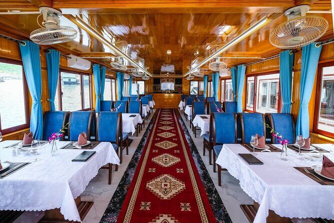 Luxury Bai Tu Long Cruise - Halong Day Trip from Hanoi - On the water at lunch time: check-in, welcome drink, and the buffet reality