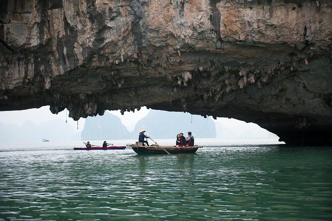 Overnight Bai Tu Long Bay Cruise from Hanoi - Ha Long Bay All-Inclusive - Day 1 on the water: cave time, hands-on cooking, and evening activities